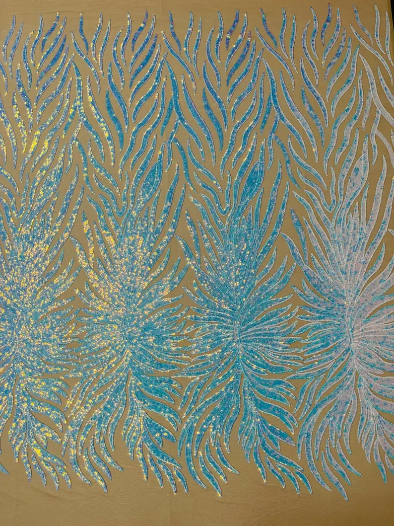 Aqua iridescent phoenix feather design with sequins embroider on a Nude 4 way stretch mesh fabric-sold by the yard.