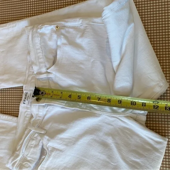 FRAME Le High Straight Blanc white jeans raw hem. Size 32