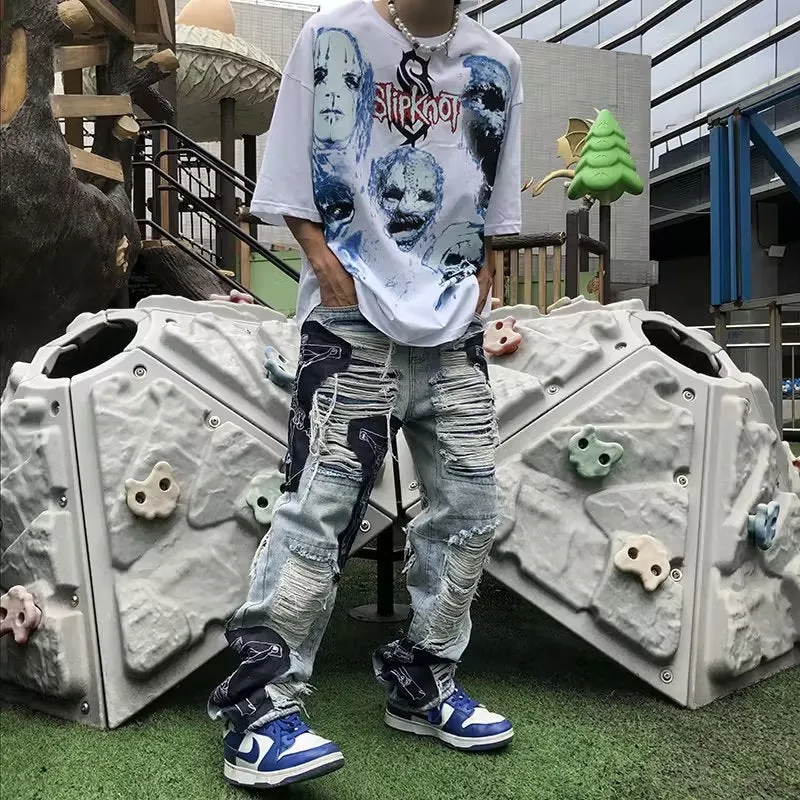 New splicing cross-style ripped slim fit jeans
