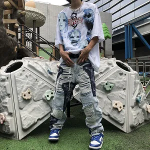 New splicing cross-style ripped slim fit jeans